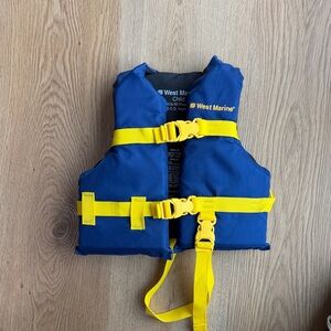 West Marine Blue and Yellow child Life Jacket